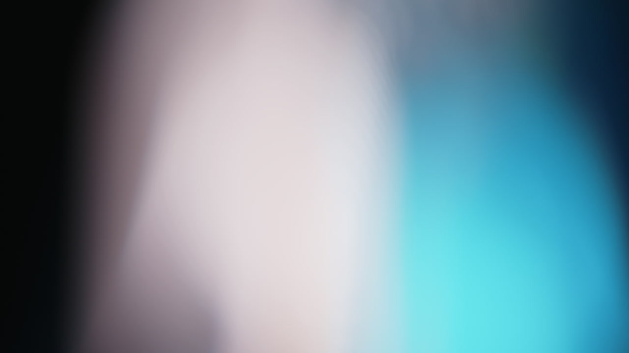 Multicolored light leaks 4k footage on black background lens studio flare leak burst overlays