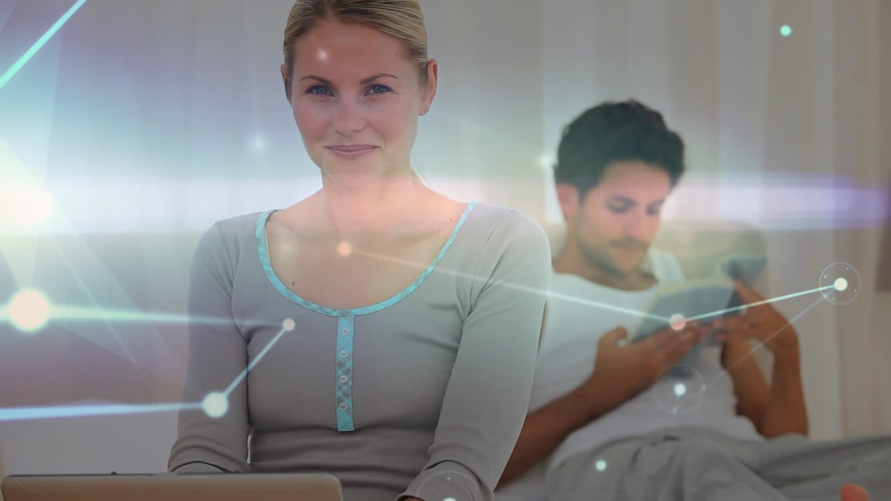 анимация пары на кровати через сеть соединений на заднем плане.