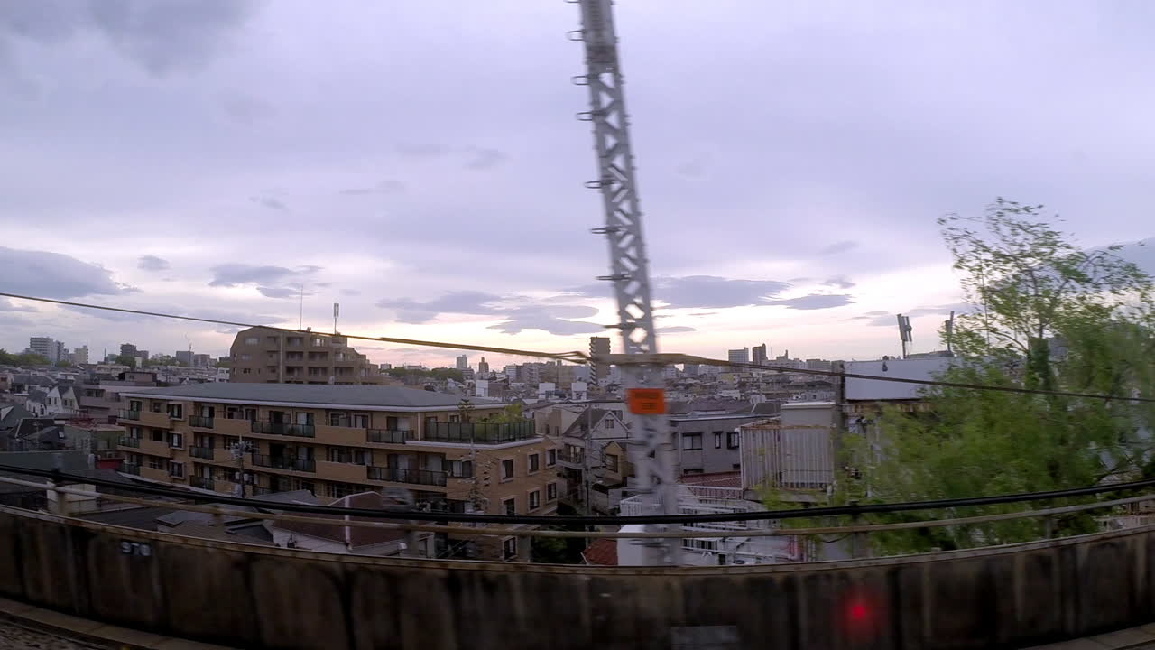 Landscape view of Japanese city from moving train