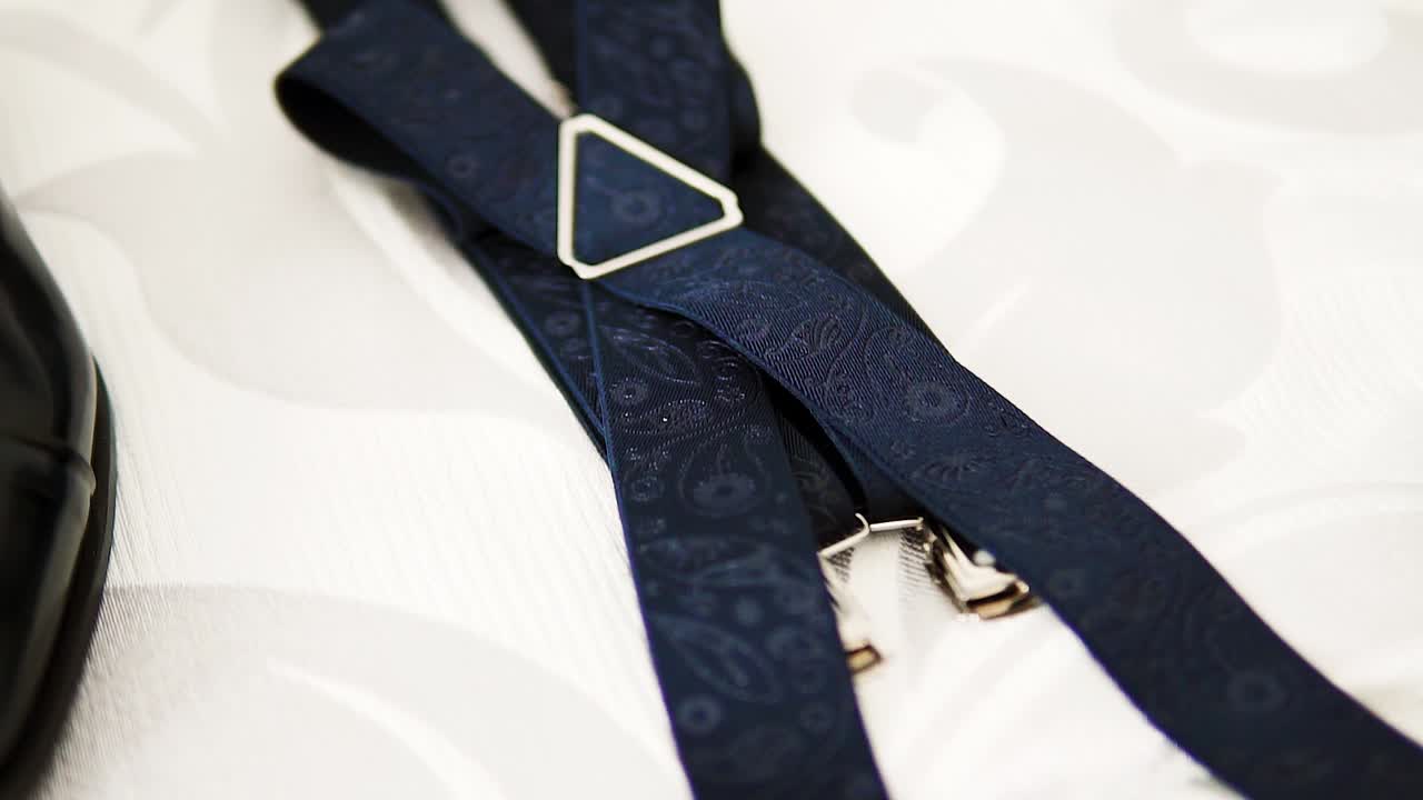 Men's suspenders, wedding accessories prepared on a wedding
