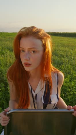 young woman in a field