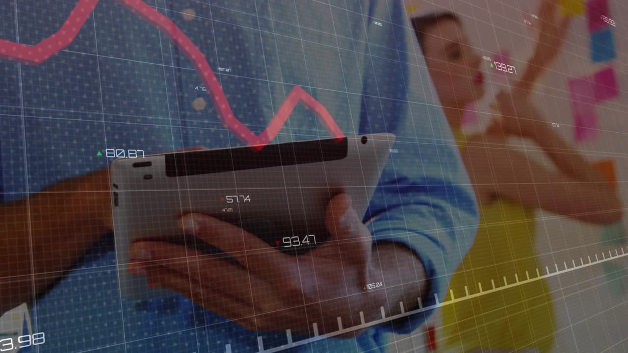 Office worker tapping tablet showing red graph for tracking tech data as colleague arranging notes