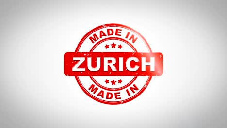 made in zurich signed stamping text wooden stamp animation. red ink on clean white paper surface background with green matte background included.