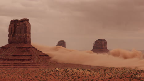dramatic dust storm in monument valley