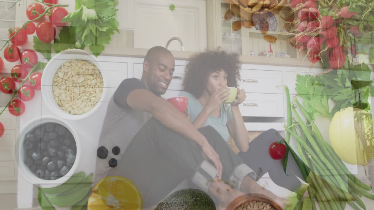 Couple sitting kitchen sipping from mugs as translucent health icons swirling evoking calm morning