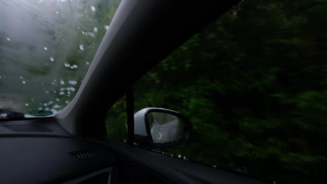 hailstones hitting a car windscreen