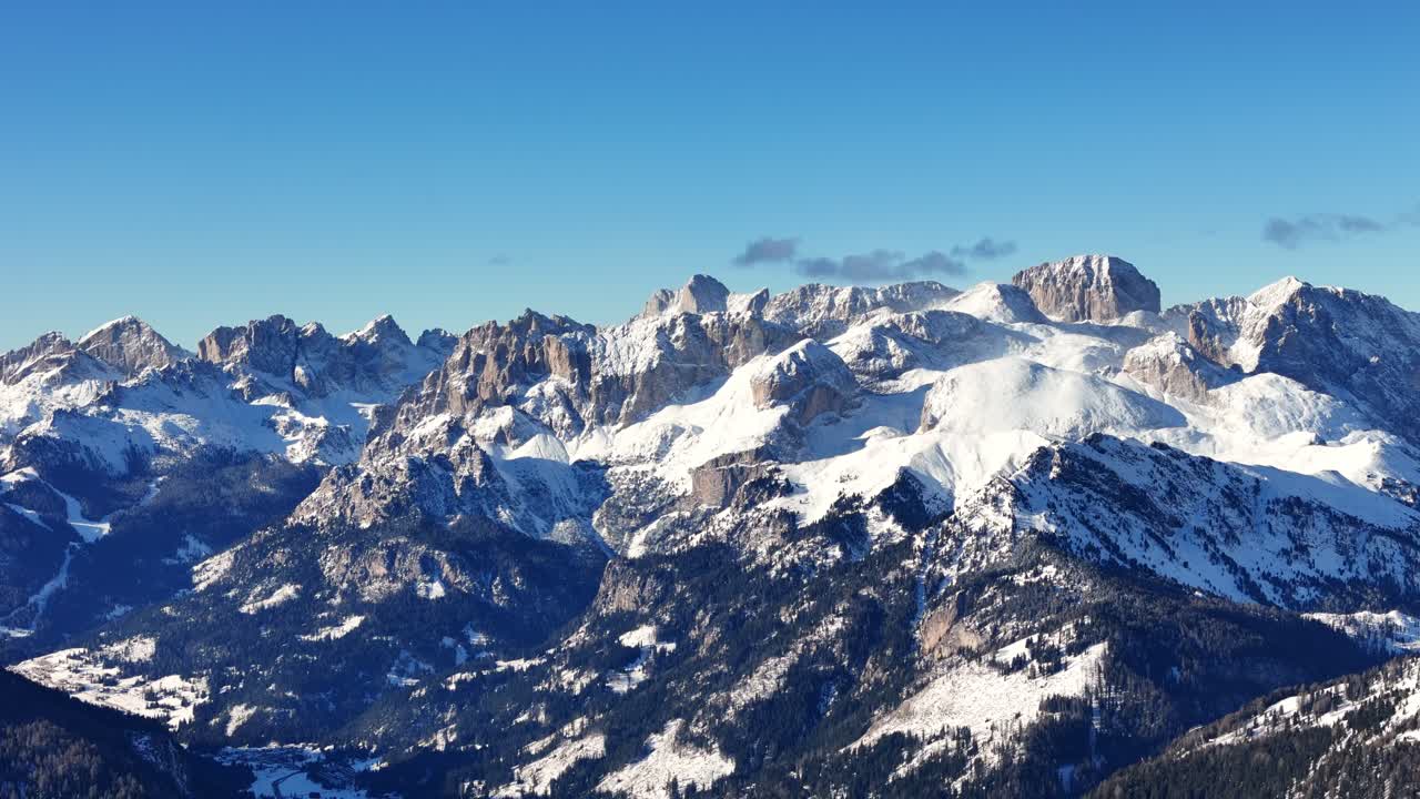3x zoom of rock formation in Italian Dolomites surrounded by rough landscape (drone footage)