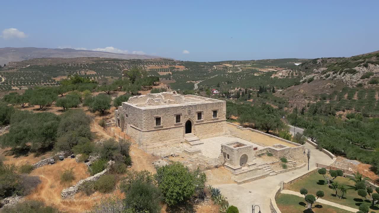 Aerial drone footage of the historic Venetian Villa De Mezzo, Lasithi, Crete, Greece, highlighting its architecture, heritage, and the beautiful Cretan landscape
