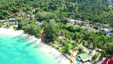 vacations destination with beach cabins and bungalows near beautiful shoreline of tropical island with turquoise lagoon in indonesia