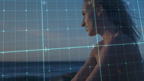gazing at ocean, woman viewing digital animation overlay on scene