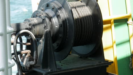 Black pulley system located on a ferry