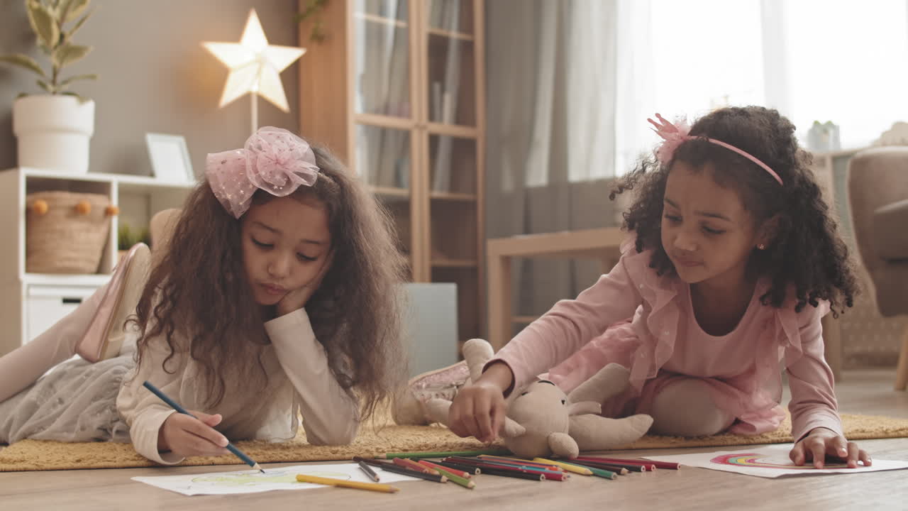 Little Sisters Lying on Floor Drawing