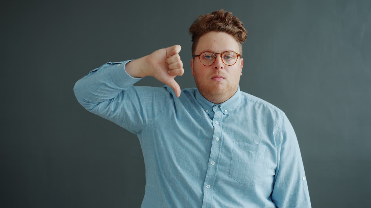 Man giving thumbs down