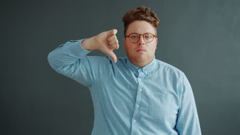 man giving thumbs down