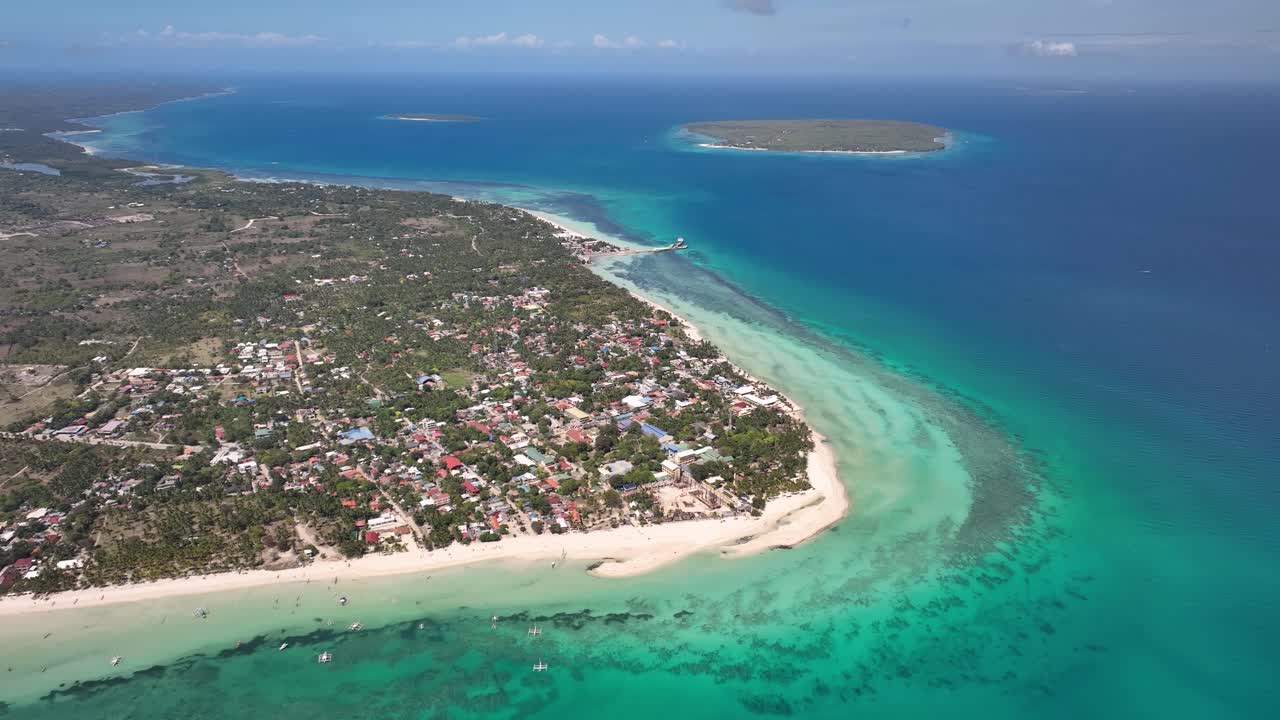 Bantayan island’s coastline with turquoise waters and sandy beaches in cebu, philippines, aerial view