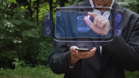 un hombre de negocios usa un holograma con una taza.