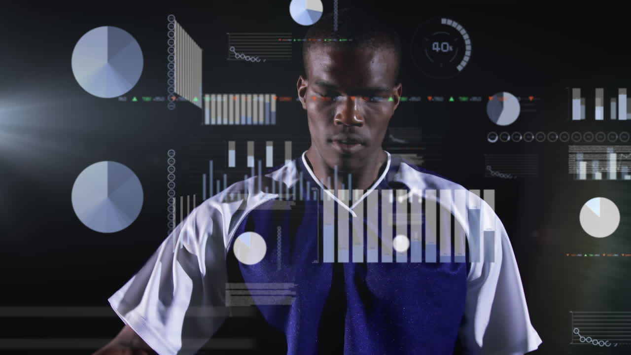 Animation of graphs and programming language over african american male player with soccer ball