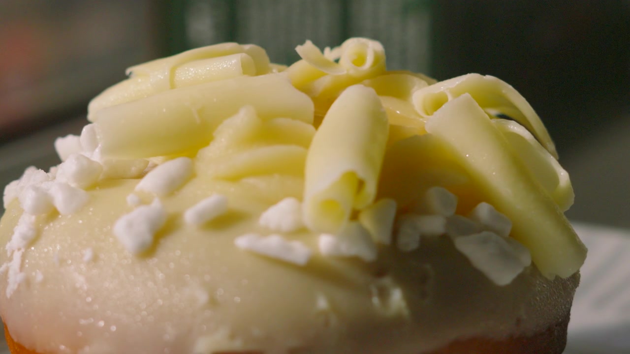 Indulgent Fresh Glazed Doughnut in Natural Light.