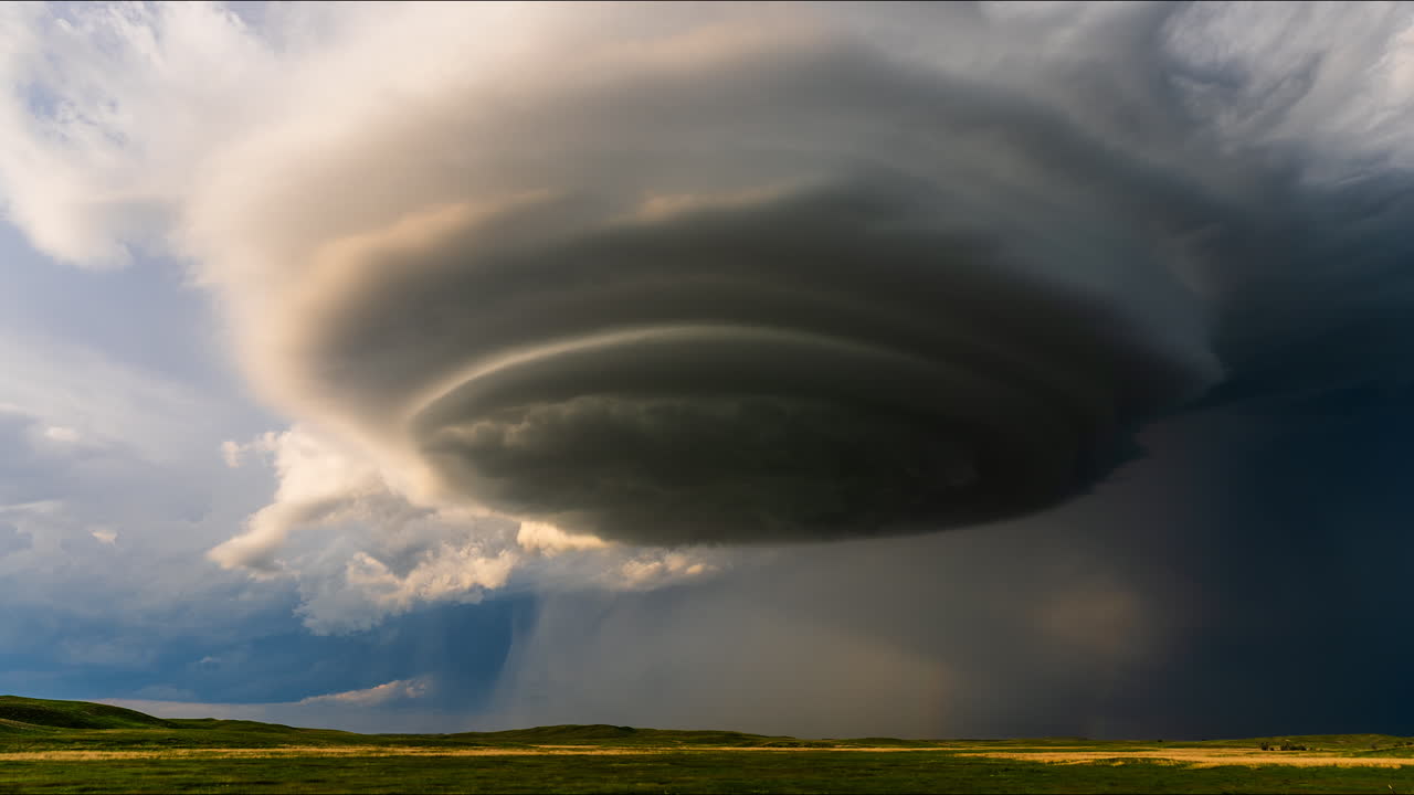 Dramatic Supercell Storm Cloud over Rural Landscape