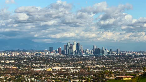 clouds over the downtown los angeles skyline in daytime in california, usa