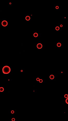 red bubbles on black background