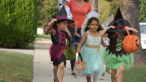 children in halloween costumes trick or treating shot on r3d