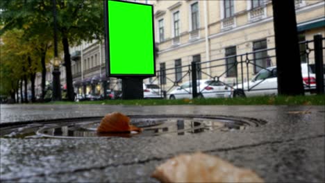 billboard green screen on a city street