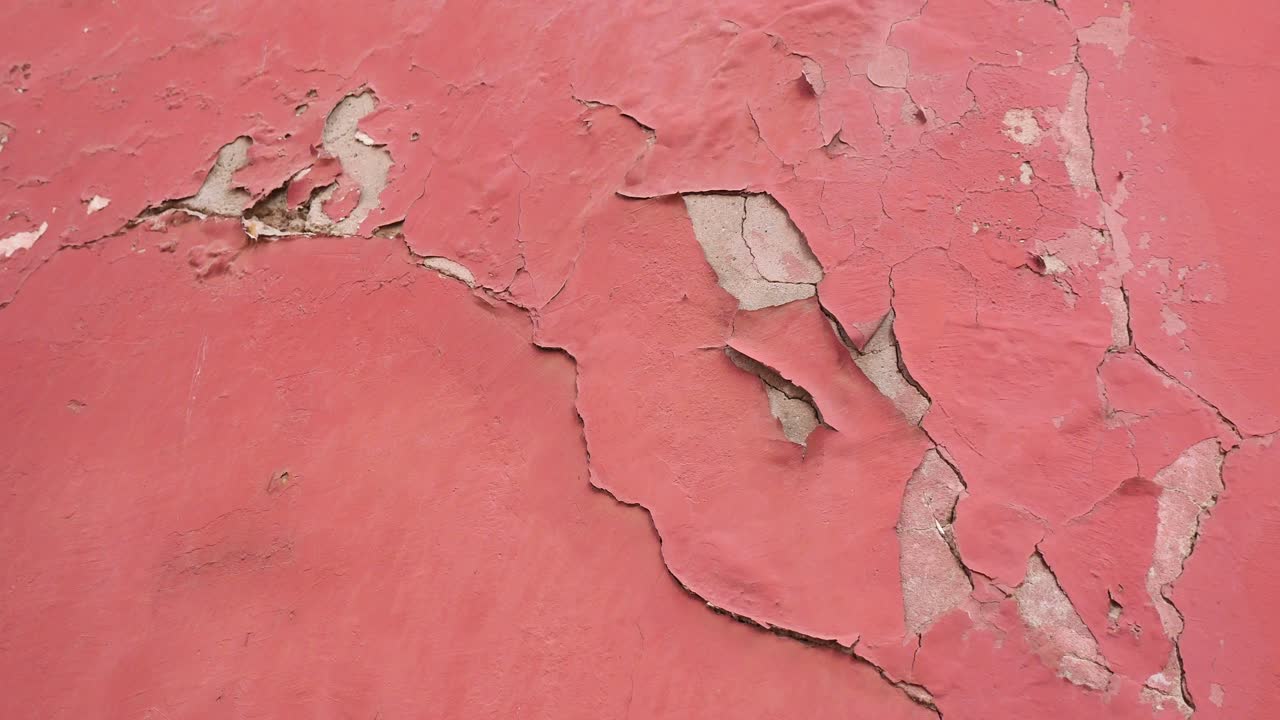Peeling Red Paint on a Wall