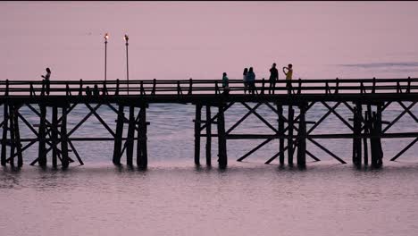 The-Mon-Bridge-is-an-old-wooden-bridge-located-in-Sangkla,-Thailand