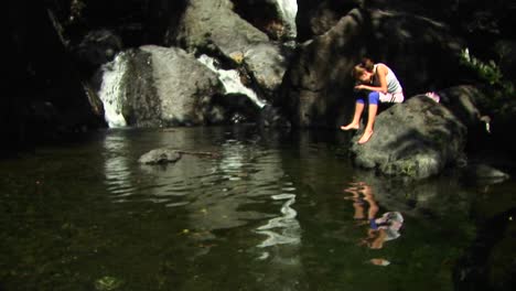 Mediumshot-Of-A-Photographer-Taking-Pictures-Of-A-Reflecting-Pool-In-California