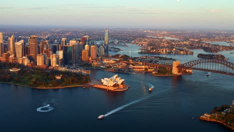 aerial view of sydney port jackson bay during early morning with ferry boats cruising, nsw australia