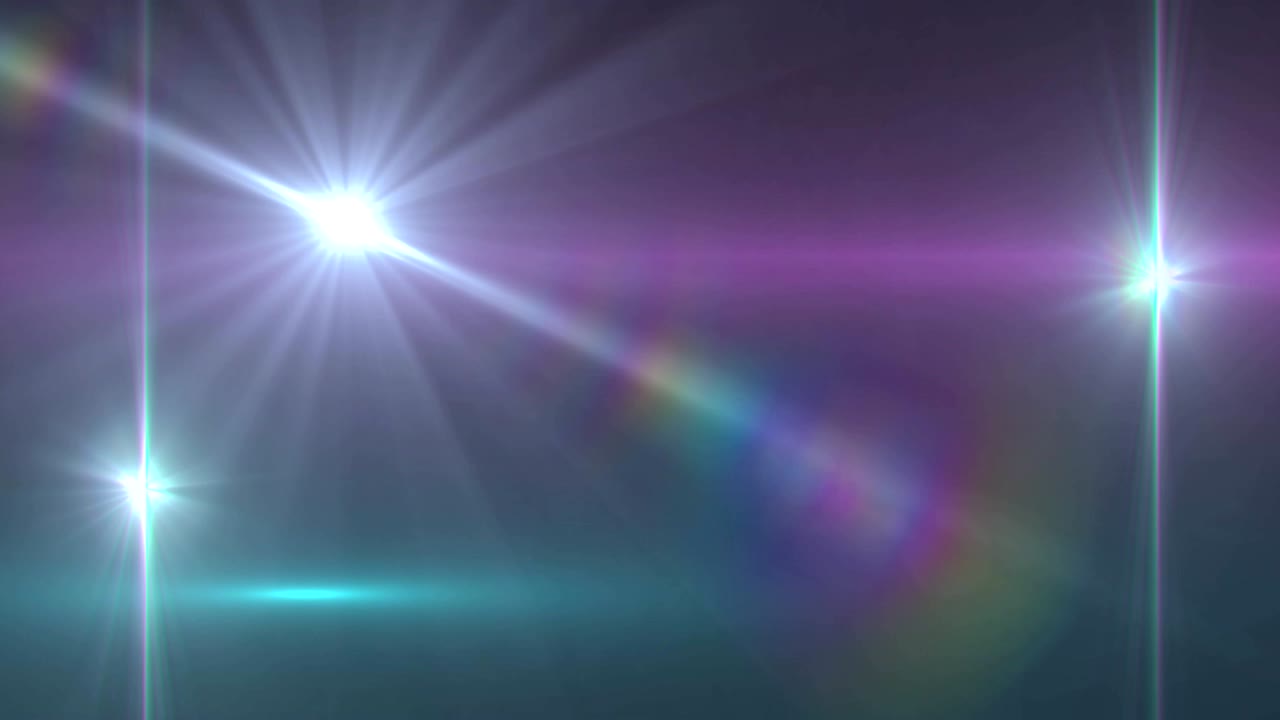 tres puntos de luz contra un fondo púrpura