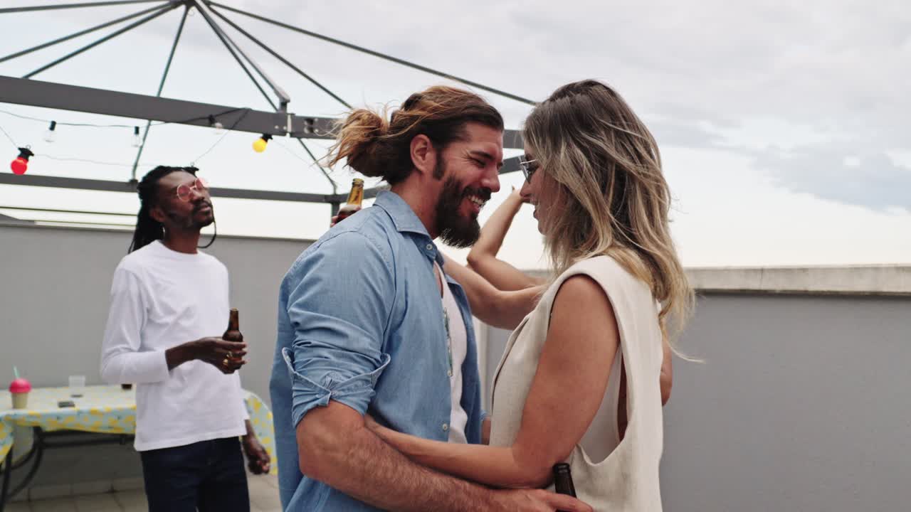 People Celebrating at a Rooftop Party