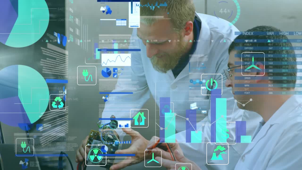 Two male robotic engineers are discussing an electric component in a warehouse