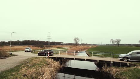 country road and bridge over canal