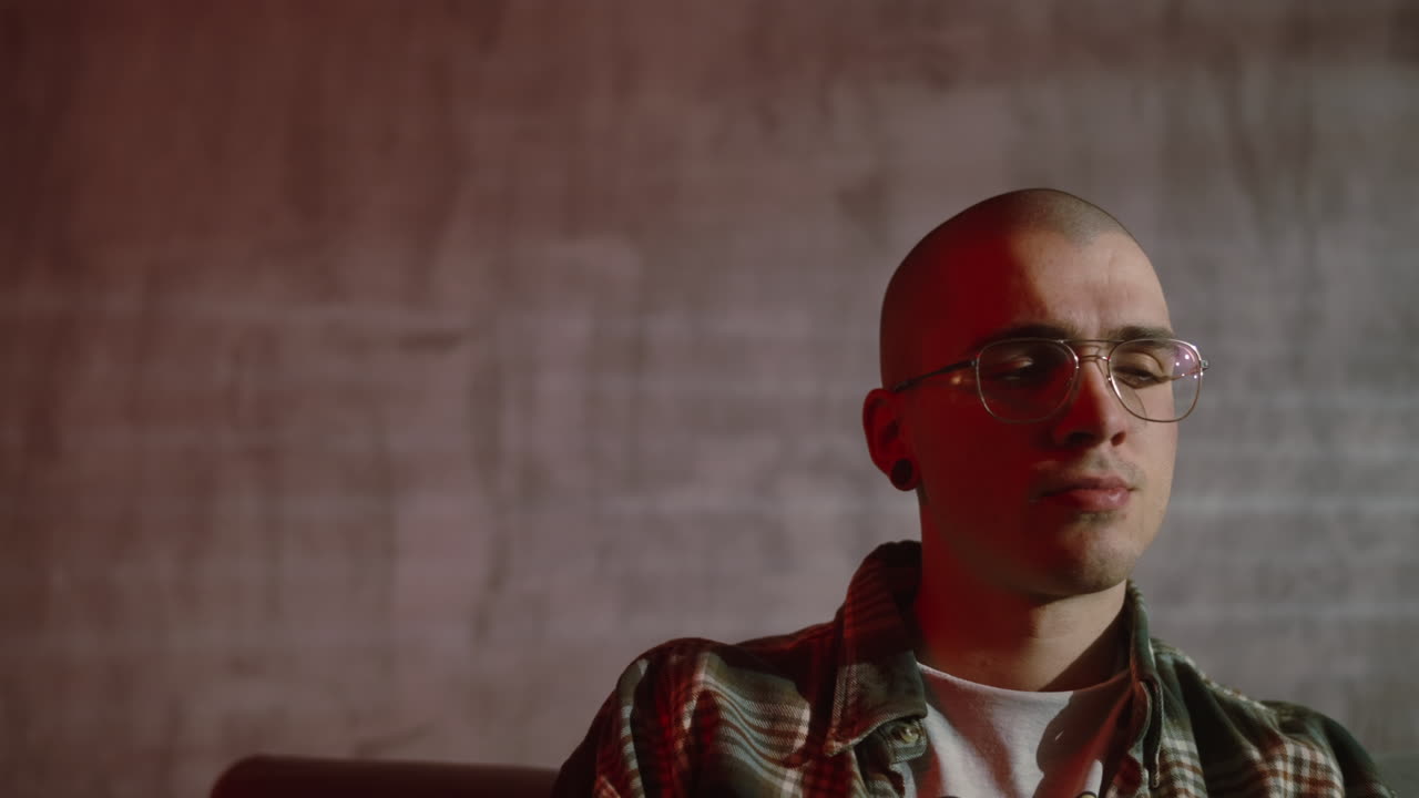 Man in Plaid Shirt with Glasses