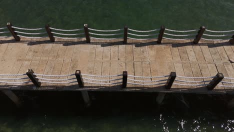 Drone-View-Tracking-Shot-of-Claver-Boardwalk,-Surigao-Del-Norte,-Philippines