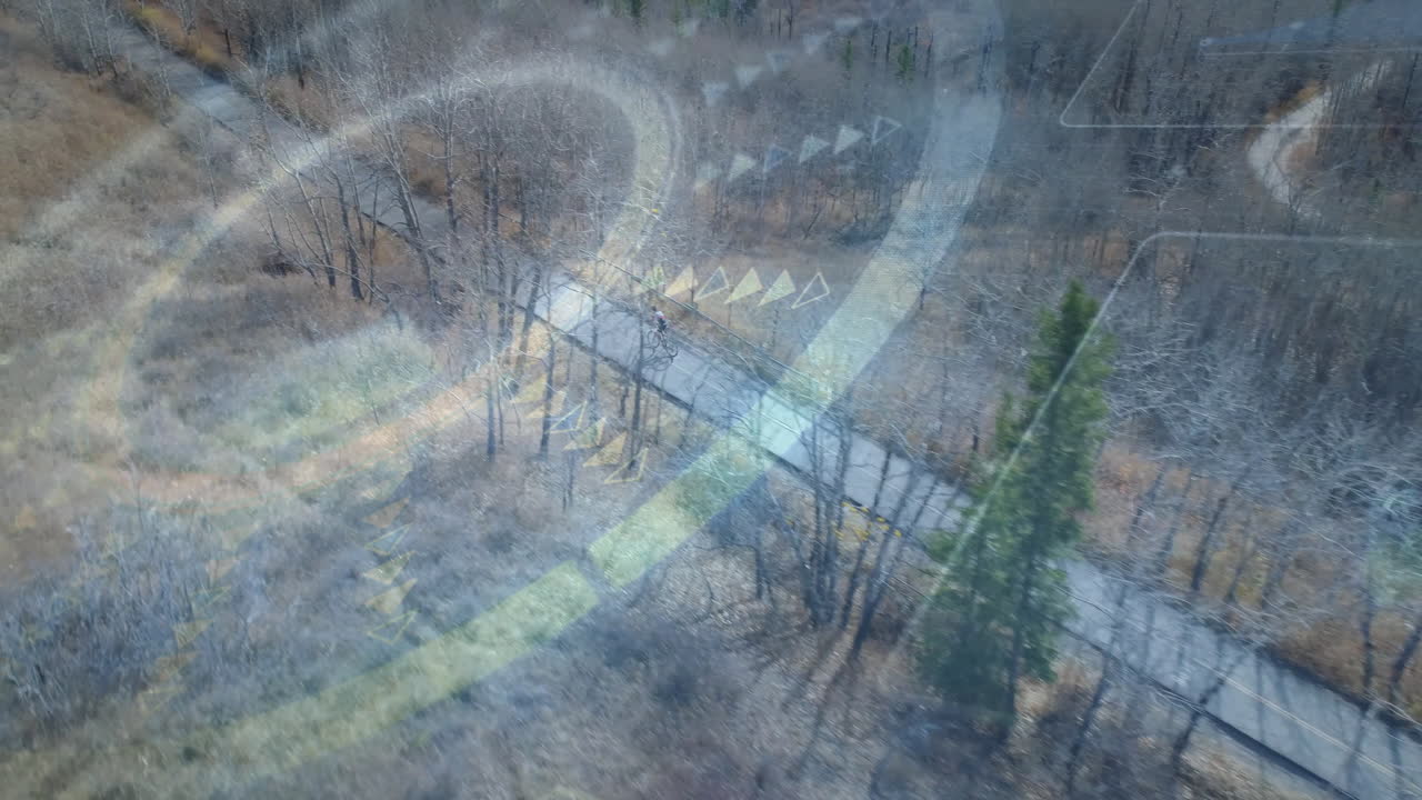 content creators overlaying winding trail mapping in technology demo, with rings and arrows