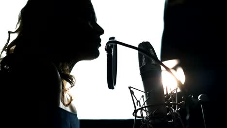 beauty woman with microphone.