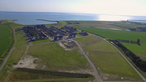 Aerial-shots-of-a-new-neighborhood-near-the-sea-in-Kruiningen,-the-Netherlands