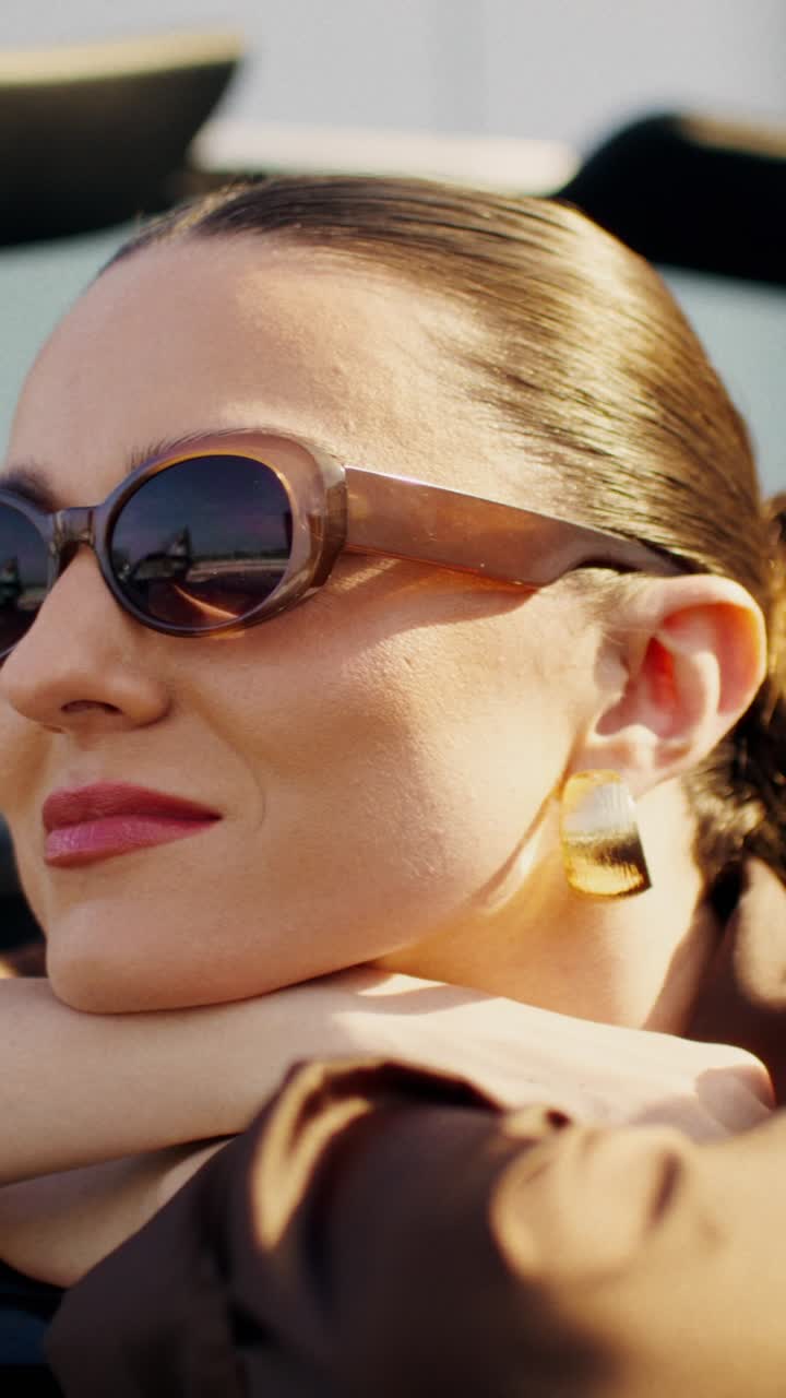 Stylish Woman in a Convertible Car