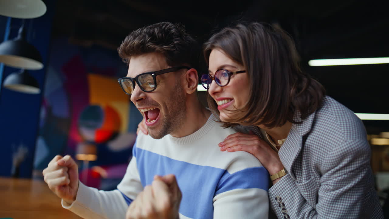 Innovative team reviewing computer screen workspace closeup. Excited colleagues
