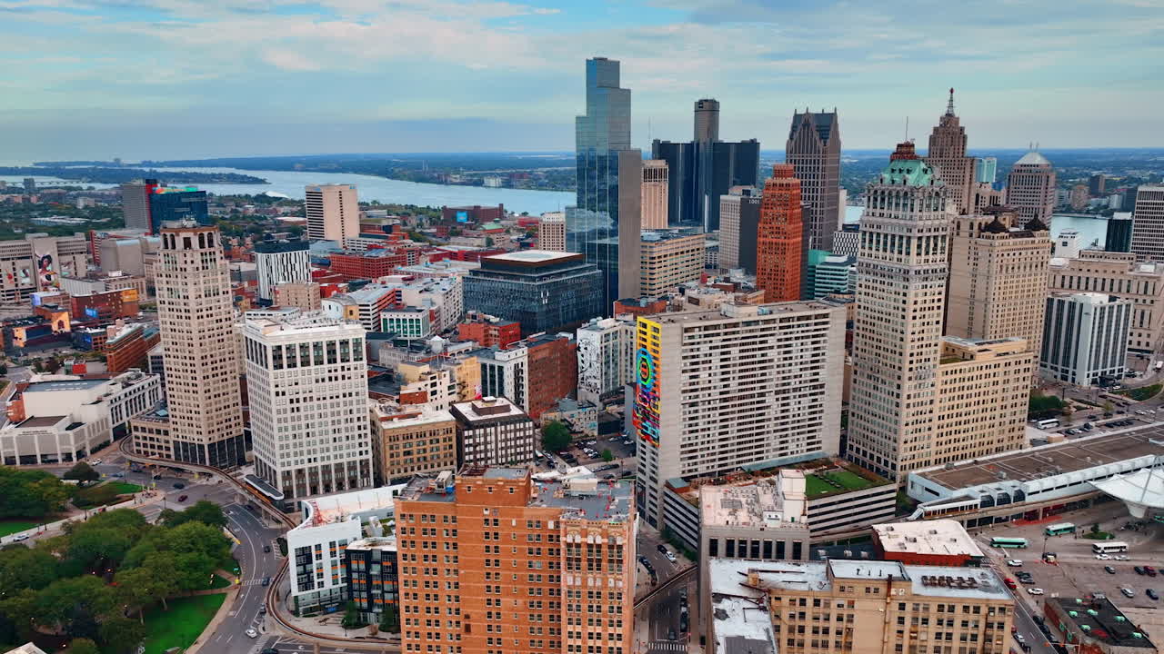 Approaching the high-rise downtown of modern Detroit, Michigan, USA. Waterscape of the Detroit River at backdrop