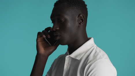 African-american-man-on-blue-background.