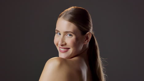 beauty portrait of a woman with ponytail