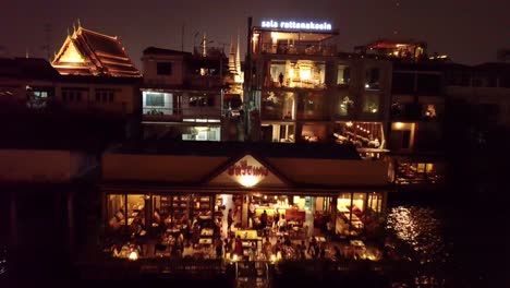 night drone shots of bangkok near wat arun temple, uhd-6