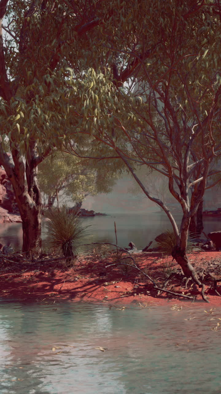 A serene creekside landscape in a reddish-toned environment
