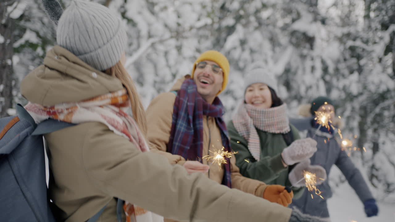 Friends Celebrating in the Snowy Forest