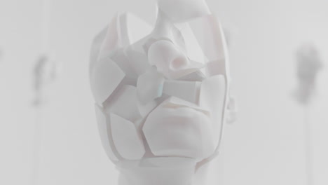 destroyed android head on spike in white space