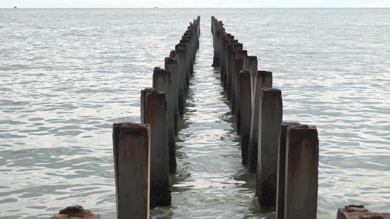 Abandoned broken pier at sea
